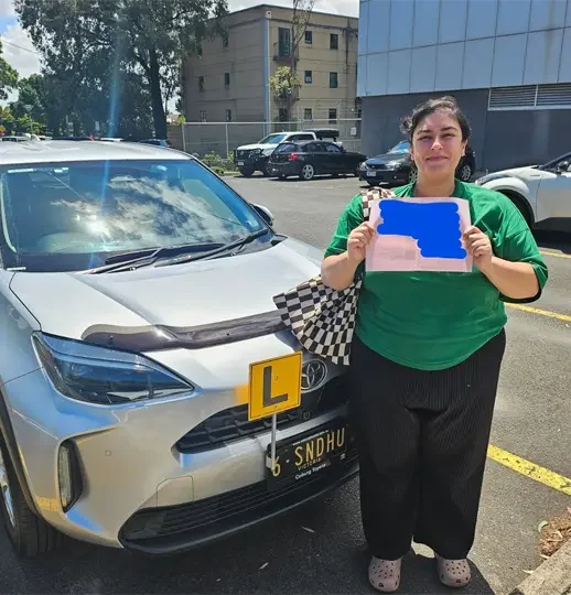 Calm automatic driving instructor helping learners become safe, confident, and test-ready